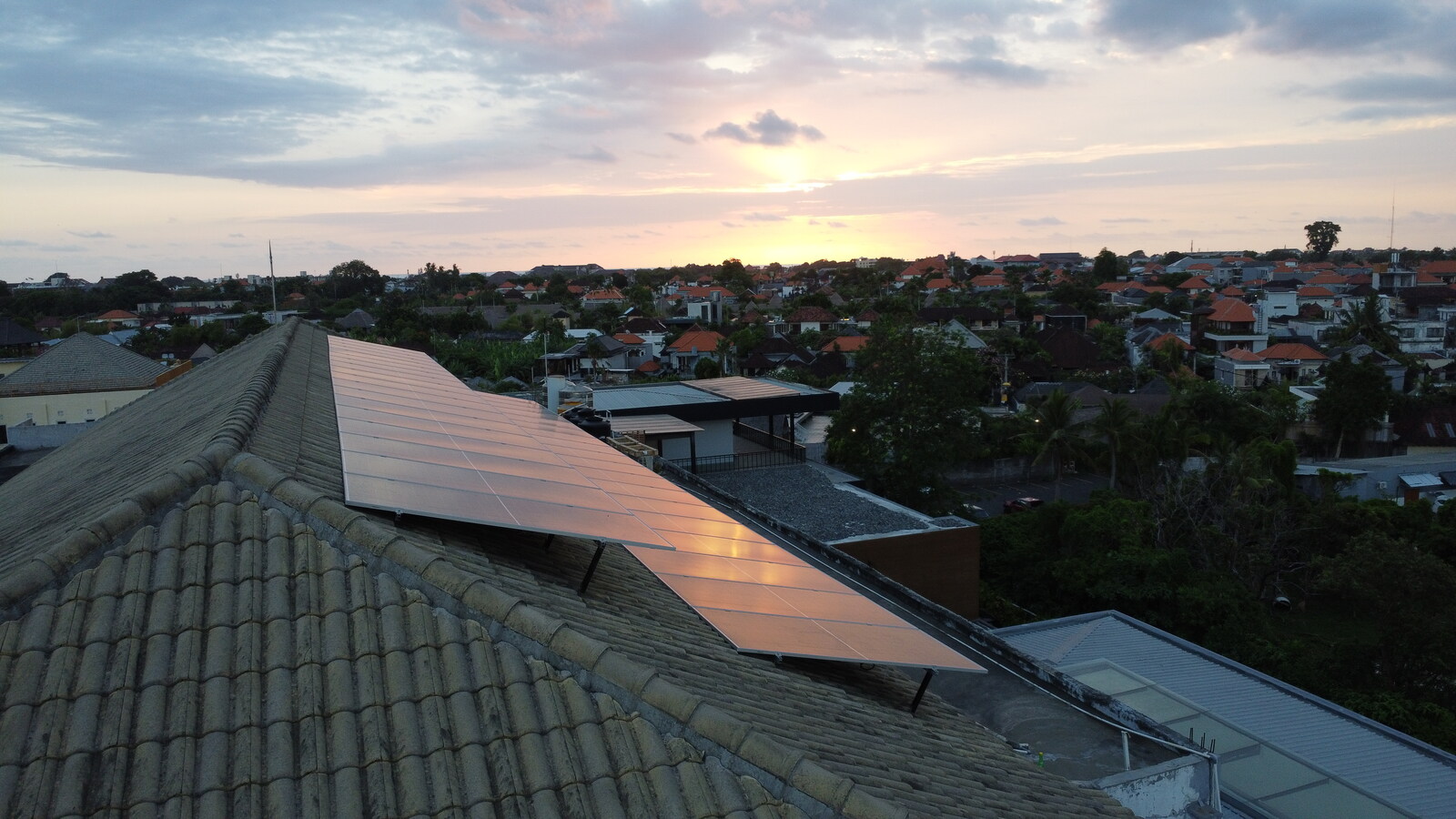 Happy family in a home powered by solar energy