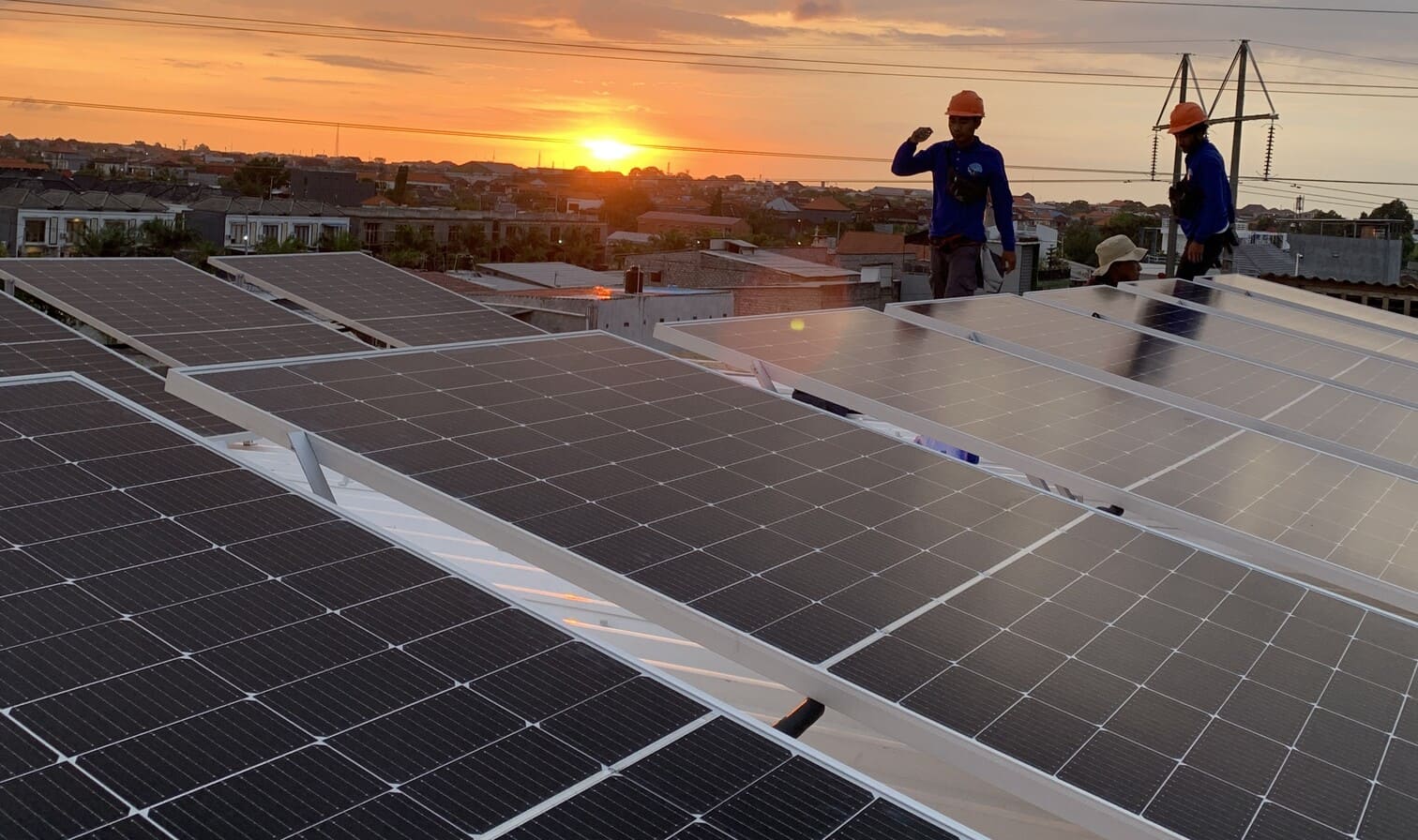 Happy family in a home powered by solar energy